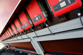 Netherlands. A row of inverters for a rooftop photovoltaic system.