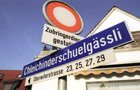 Image of a streetname sign in swiss german language also called Schwyzerdeutsch. Click to see swiss gallery.